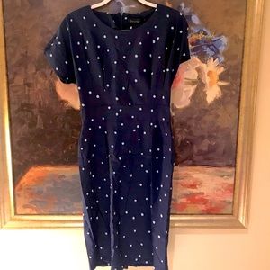 Navy blue polka-dot hourglass shaped stretchy dress
